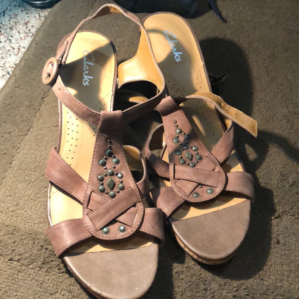 Clarks, wedges, brown with metal designs. 9.5M